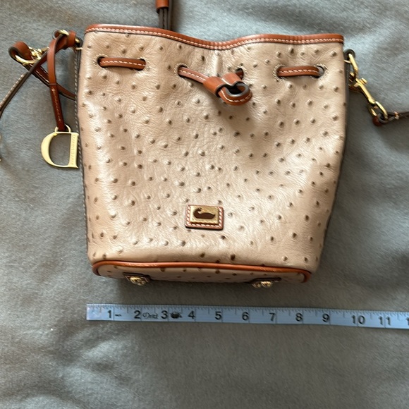 Dooney & Bourke bucket purse. Color~tan & camel ostrich leather. Pics for size. - Picture 12 of 16